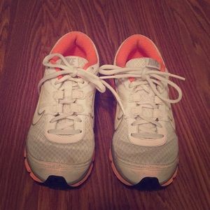 White Nike’s with coral sole